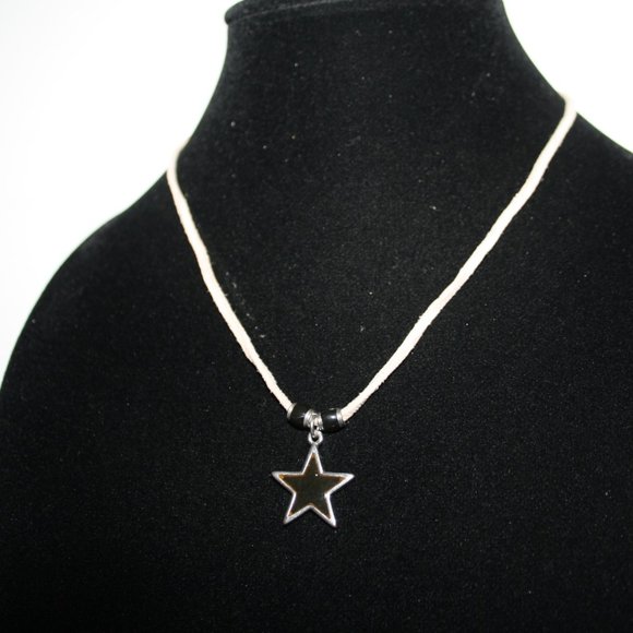 Beautiful cream necklace with mood changing star